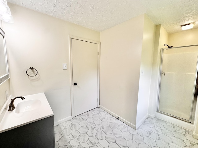13165 Burns Rd, California, KY 41007 - bathroom with a textured ceiling, vanity, and a shower with door