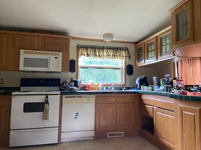 2060 Augusta Minerva Rd, Augusta, KY 41002 - kitchen featuring white appliances, tile countertops, and brown cabinetry