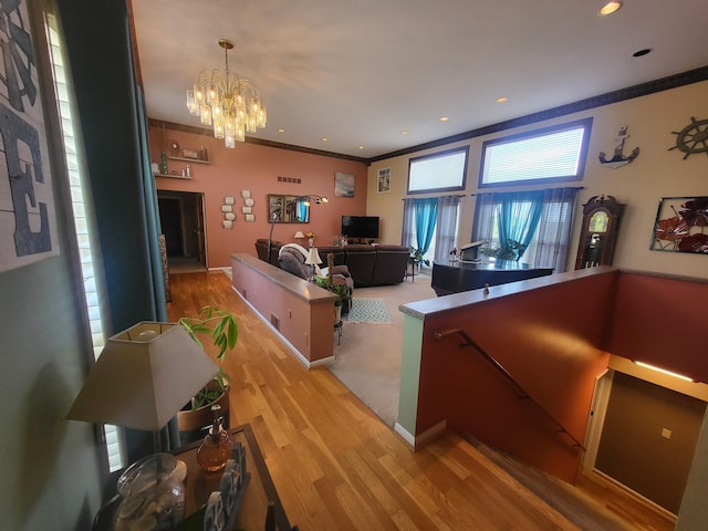 5809 Taylor Mill Rd, Covington, KY 41015 - living room with a chandelier, light wood-type flooring, ornamental molding, and recessed lighting