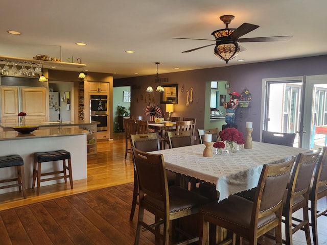 5809 Taylor Mill Rd, Covington, KY 41015 - dining space with dark wood-style floors, recessed lighting, and a ceiling fan