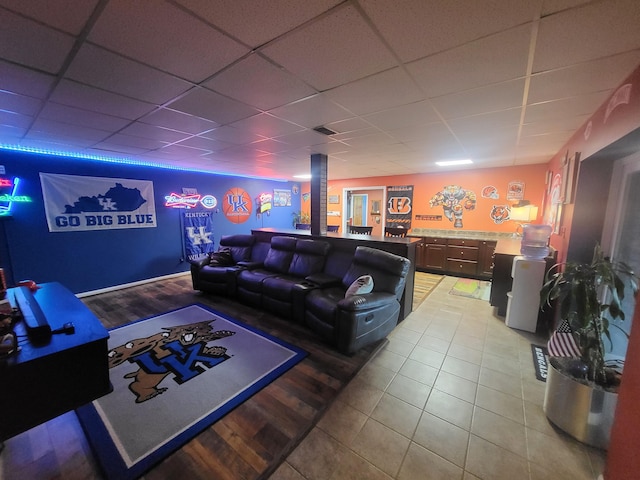 5809 Taylor Mill Rd, Covington, KY 41015 - living area featuring a paneled ceiling and wood finished floors
