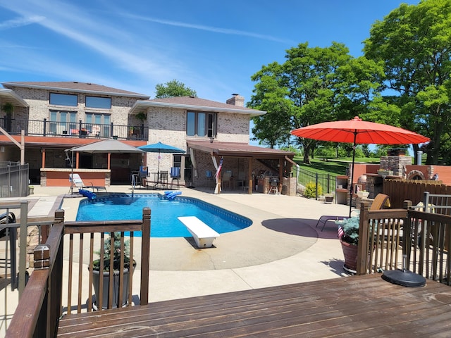 5809 Taylor Mill Rd, Covington, KY 41015 - view of swimming pool with a diving board and a patio area