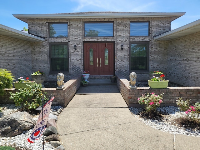 5809 Taylor Mill Rd, Covington, KY 41015 - view of exterior entry featuring brick siding