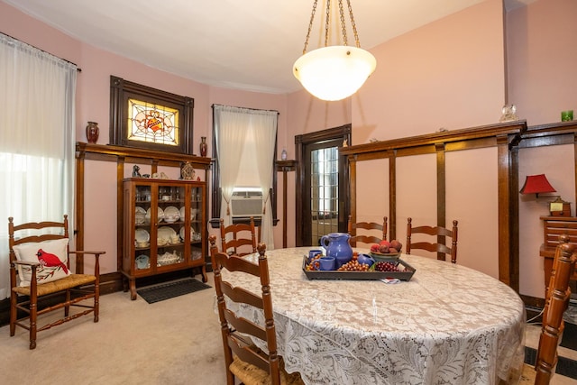321 6th Ave, Dayton, KY 41074 - dining room featuring light carpet, cooling unit, and plenty of natural light
