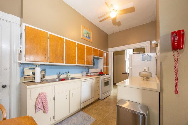 321 6th Ave, Dayton, KY 41074 - kitchen featuring white appliances, ceiling fan, light countertops, and brown cabinetry