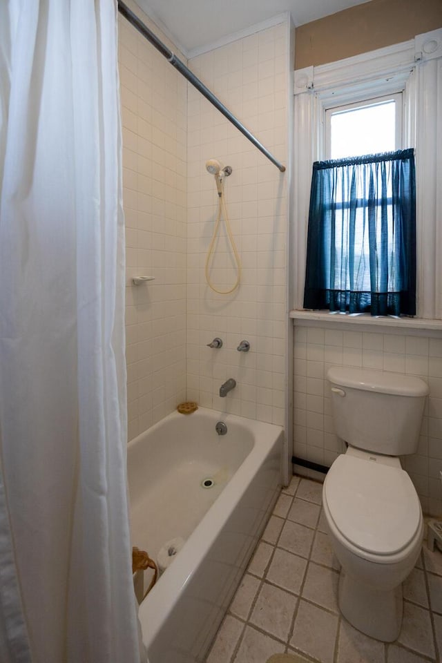 321 6th Ave, Dayton, KY 41074 - bathroom featuring shower / bath combination with curtain and tile patterned flooring