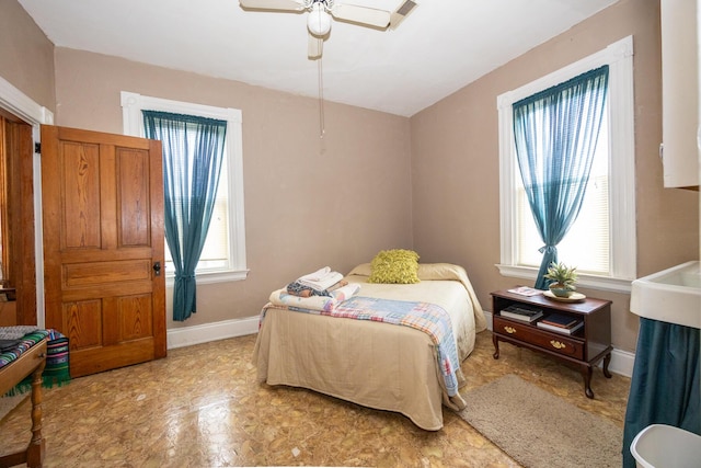 321 6th Ave, Dayton, KY 41074 - bedroom featuring baseboards and a ceiling fan