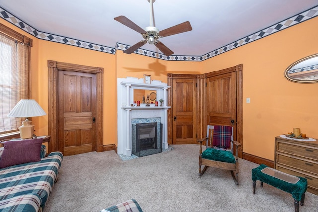 321 6th Ave, Dayton, KY 41074 - carpeted living room featuring ceiling fan and a fireplace