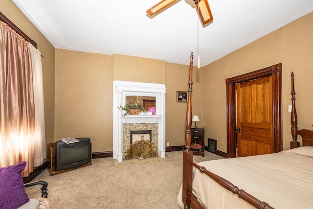 321 6th Ave, Dayton, KY 41074 - bedroom featuring light colored carpet, a fireplace, and a ceiling fan