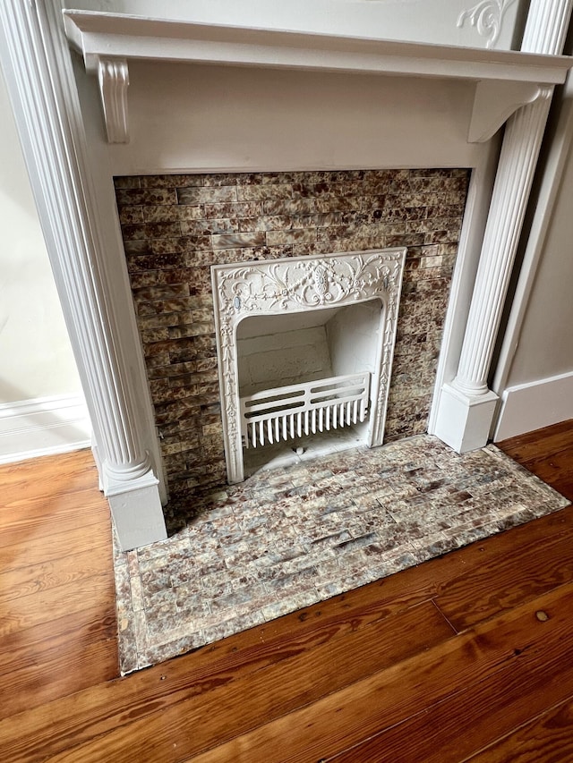 626 W 12th St, Covington, KY 41011 - detailed view of baseboards and wood finished floors