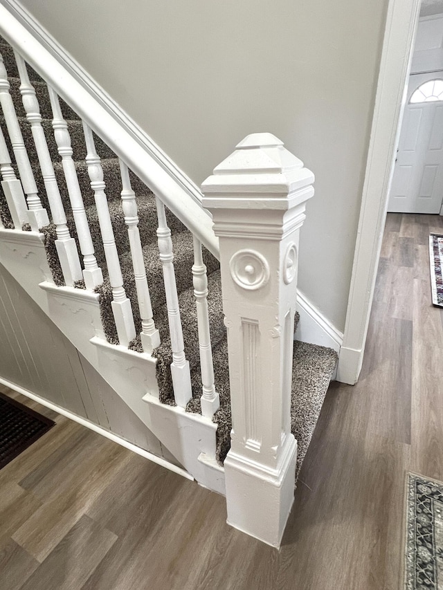 626 W 12th St, Covington, KY 41011 - staircase with wood finished floors and baseboards