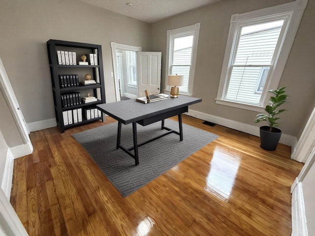 626 W 12th St, Covington, KY 41011 - home office with wood finished floors and baseboards