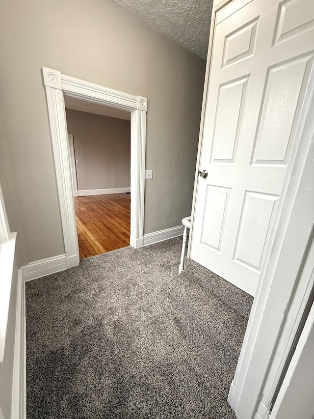 626 W 12th St, Covington, KY 41011 - unfurnished bedroom with carpet and a textured ceiling