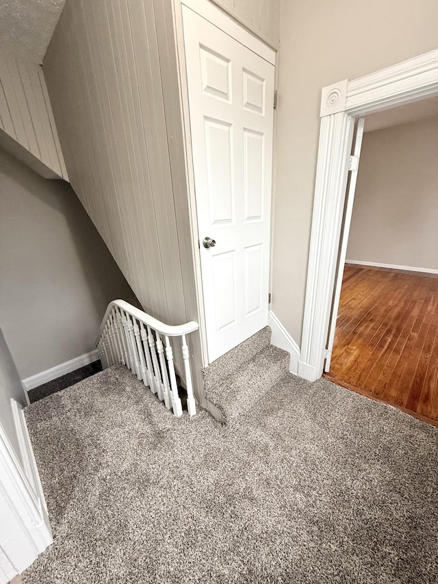 626 W 12th St, Covington, KY 41011 - stairs featuring baseboards and carpet floors