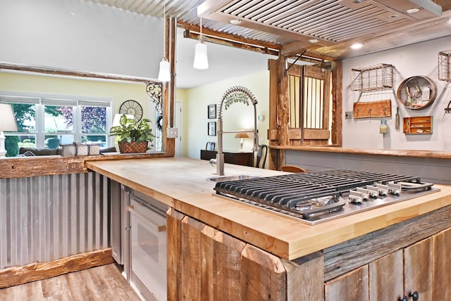 2520 Frank St, Villa Hills, KY 41017 - kitchen with butcher block counters, stainless steel gas stovetop, custom range hood, light wood-type flooring, and recessed lighting