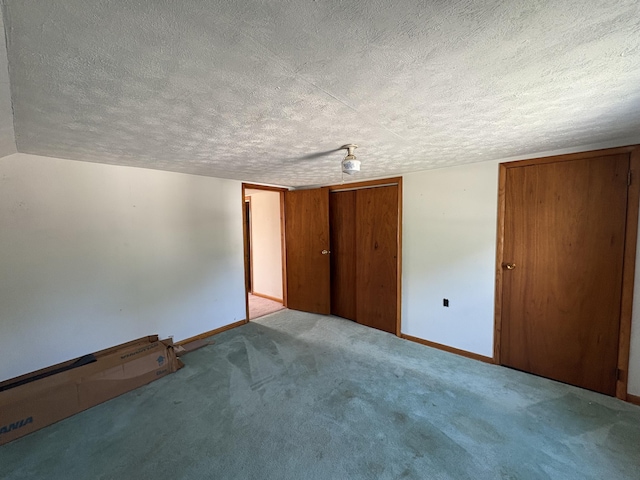 617 Woolery St, Falmouth, KY 41040 - unfurnished bedroom with a textured ceiling and carpet