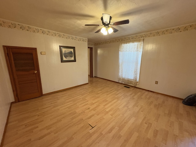 617 Woolery St, Falmouth, KY 41040 - empty room featuring light wood finished floors and a ceiling fan