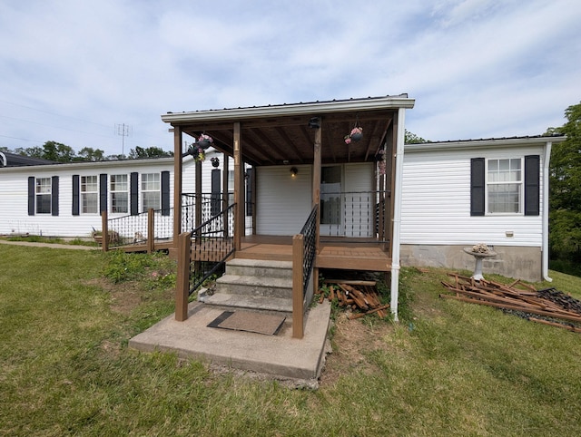 113 Lynn Ln, Falmouth, KY 41040 - view of front of house with a front lawn and covered porch