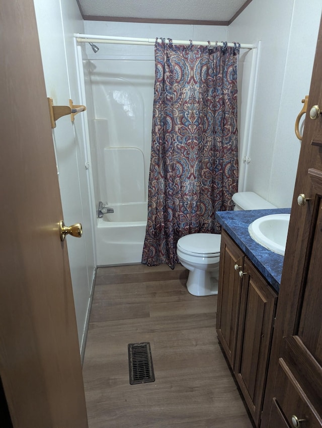 113 Lynn Ln, Falmouth, KY 41040 - full bathroom with wood finished floors, shower / bathtub combination with curtain, and vanity