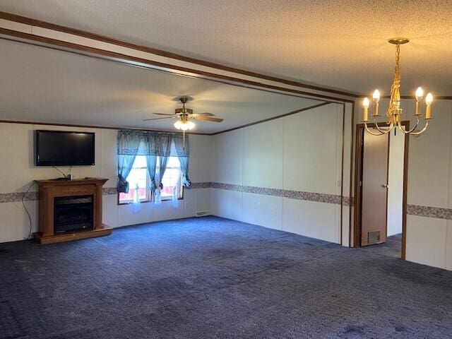 113 Lynn Ln, Falmouth, KY 41040 - unfurnished living room featuring carpet flooring, a chandelier, a textured ceiling, a fireplace with raised hearth, and ceiling fan