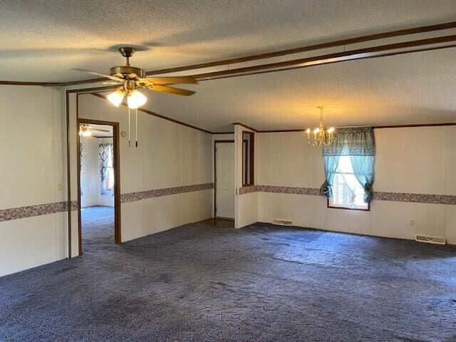 113 Lynn Ln, Falmouth, KY 41040 - unfurnished room with dark carpet, lofted ceiling, a chandelier, ceiling fan, and wainscoting