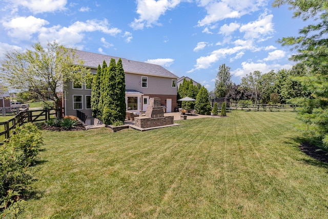 1312 Deer Hollow Ct, Hebron, KY 41048 - fenced backyard featuring a patio and an outdoor hangout area