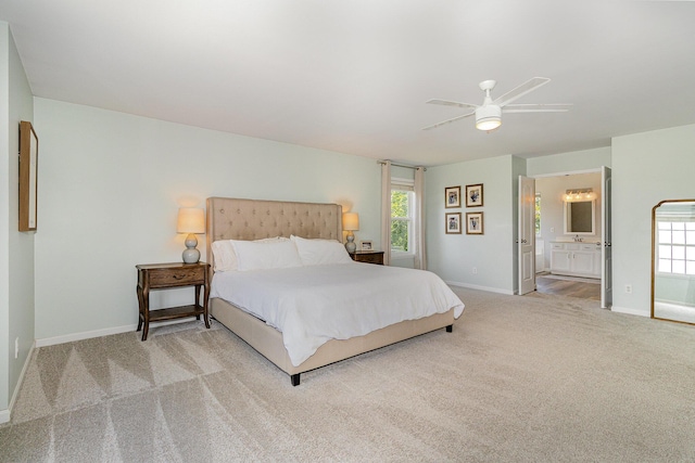 1312 Deer Hollow Ct, Hebron, KY 41048 - bedroom featuring light carpet, multiple windows, ceiling fan, and connected bathroom