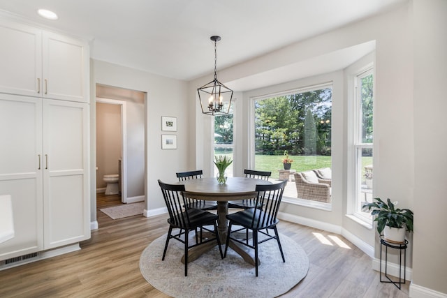 1312 Deer Hollow Ct, Hebron, KY 41048 - dining space featuring a chandelier and light wood finished floors