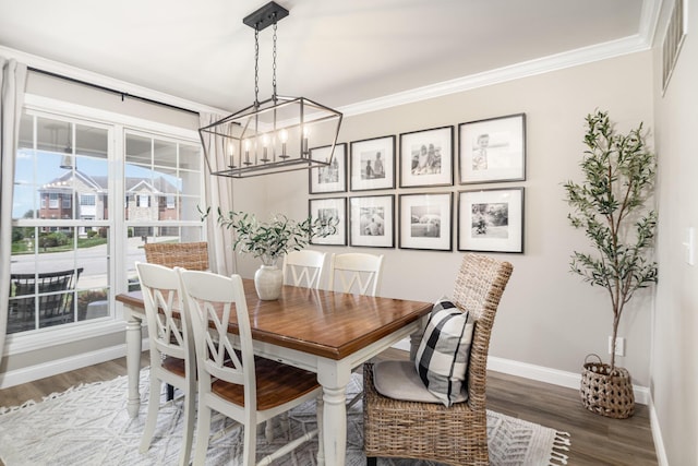 1312 Deer Hollow Ct, Hebron, KY 41048 - dining room with ornamental molding, wood finished floors, and a chandelier