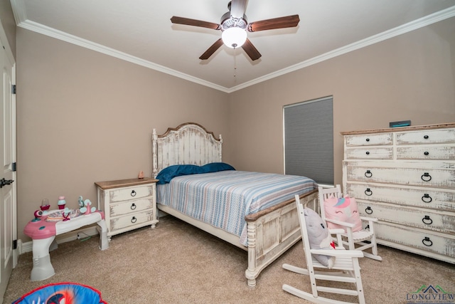 carpeted bedroom featuring ceiling fan and crown molding