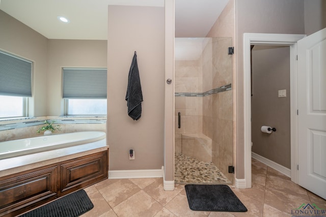 bathroom with tile patterned flooring and plus walk in shower