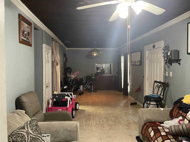 living room featuring ceiling fan and ornamental molding