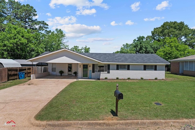 210 Southview Dr, Henderson, TX 75654 - ranch-style home with concrete driveway, brick siding, and an attached carport