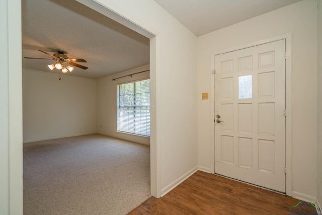 foyer featuring hardwood / wood-style floors and ceiling fan