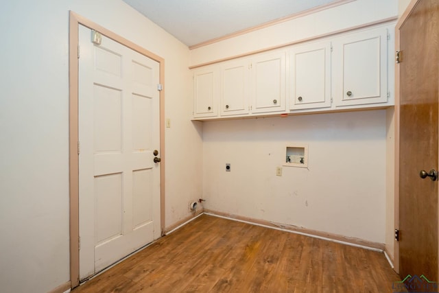 laundry room featuring hookup for a washing machine, wood-type flooring, cabinets, and hookup for an electric dryer