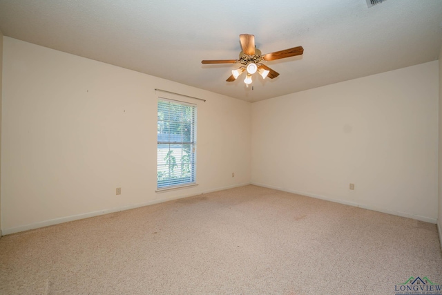 unfurnished room featuring carpet flooring and ceiling fan