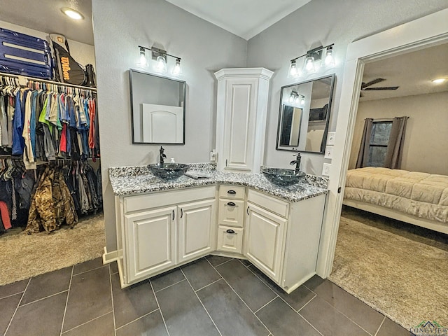 bathroom featuring vanity and tile patterned floors