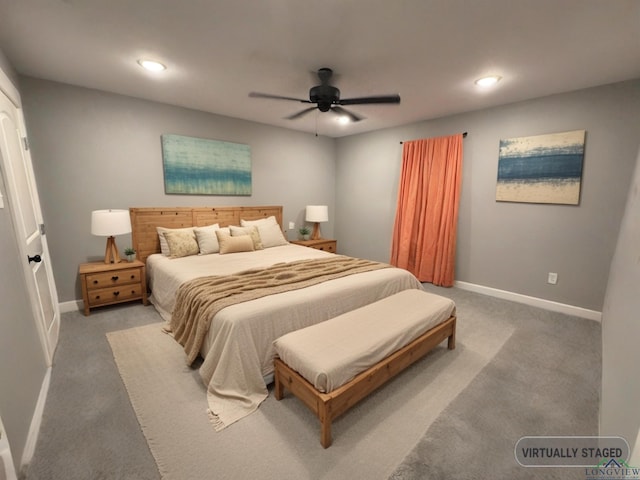 carpeted bedroom featuring ceiling fan