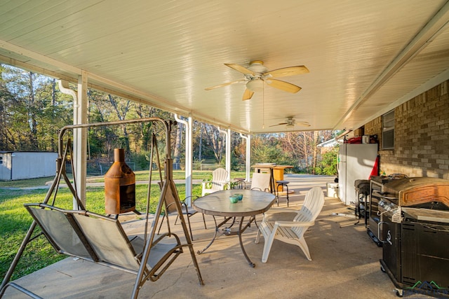 view of patio / terrace featuring ceiling fan