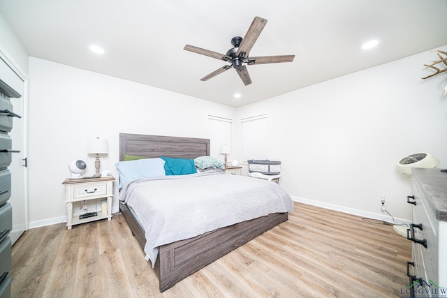 bedroom featuring ceiling fan and light wood-type flooring