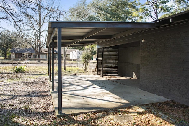 view of patio / terrace with a carport