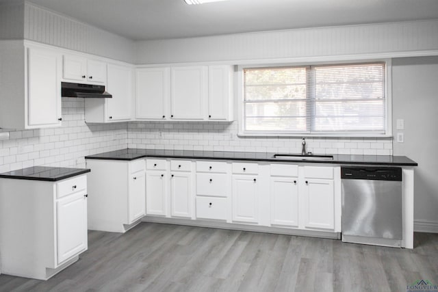 kitchen with sink, stainless steel dishwasher, white cabinets, and light wood-type flooring