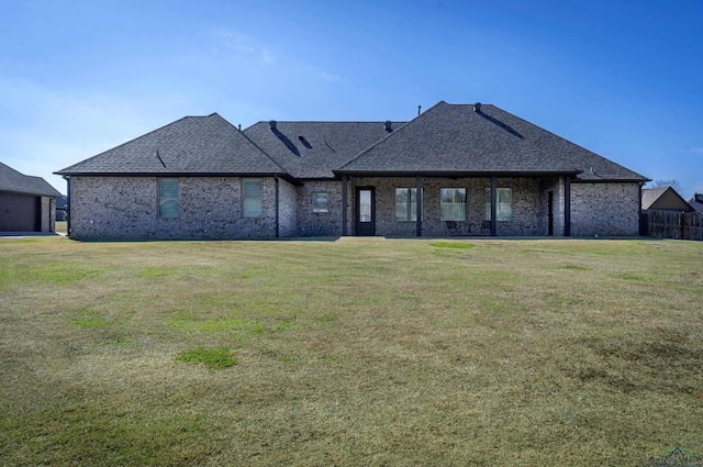 view of front of home with a front yard