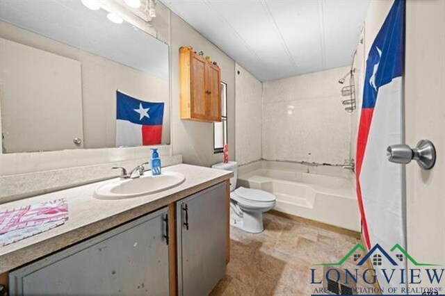 full bathroom with shower / tub combination, vanity, and toilet