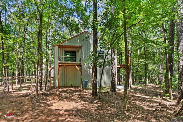 12493 S State Highway 87, Shelbyville, TX 75973 - view of outbuilding with cooling unit