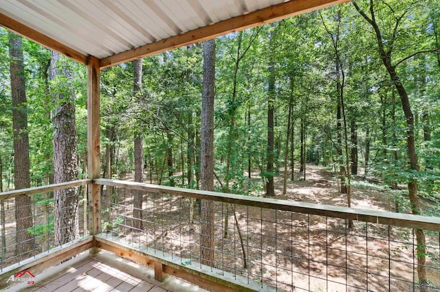 12493 S State Highway 87, Shelbyville, TX 75973 - deck featuring a wooded view