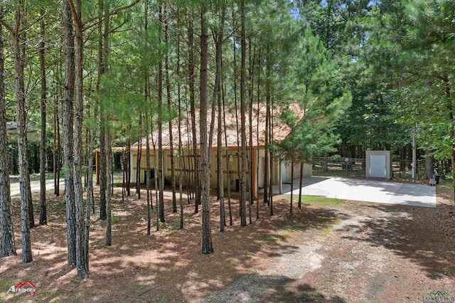 12493 S State Highway 87, Shelbyville, TX 75973 - view of dirt / gravel road with a gate