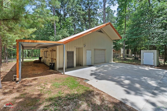 12493 S State Highway 87, Shelbyville, TX 75973 - garage with a detached garage and concrete driveway