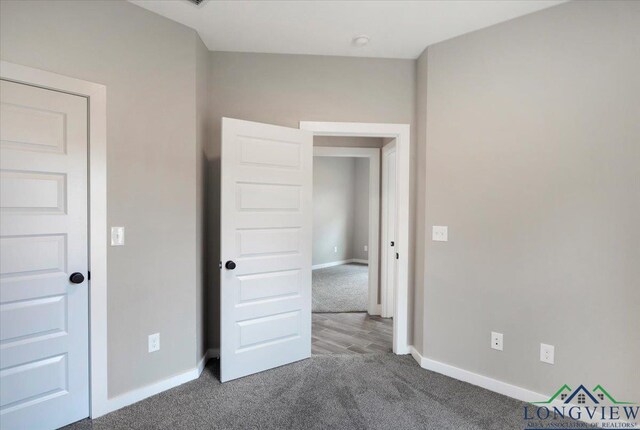 16226 Crossing Cir, Lindale, TX 75771 - unfurnished bedroom featuring carpet floors and baseboards