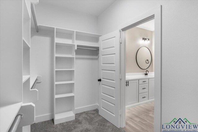 16226 Crossing Cir, Lindale, TX 75771 - spacious closet featuring a sink